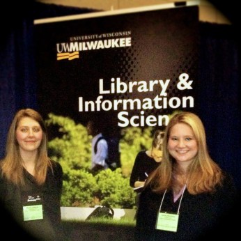 At the Exhibit Booth with Student Volunteer